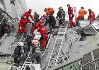 Rescuers race to save survivors
